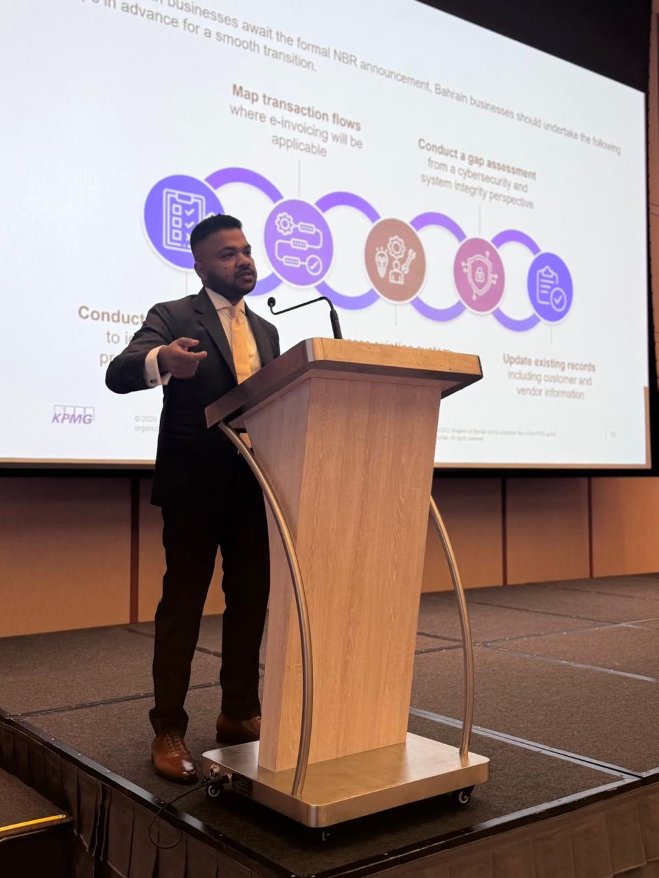 Ekansh Agrawal speaking at a KPMG e-invoicing conference on Bahrain e-invoicing next steps
